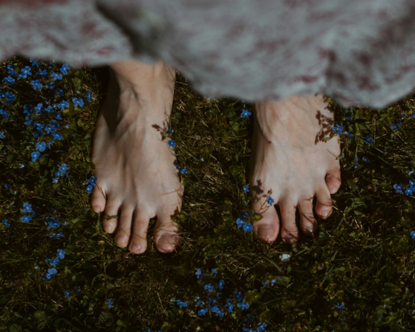 Barefoot on grass — natural grounding connection