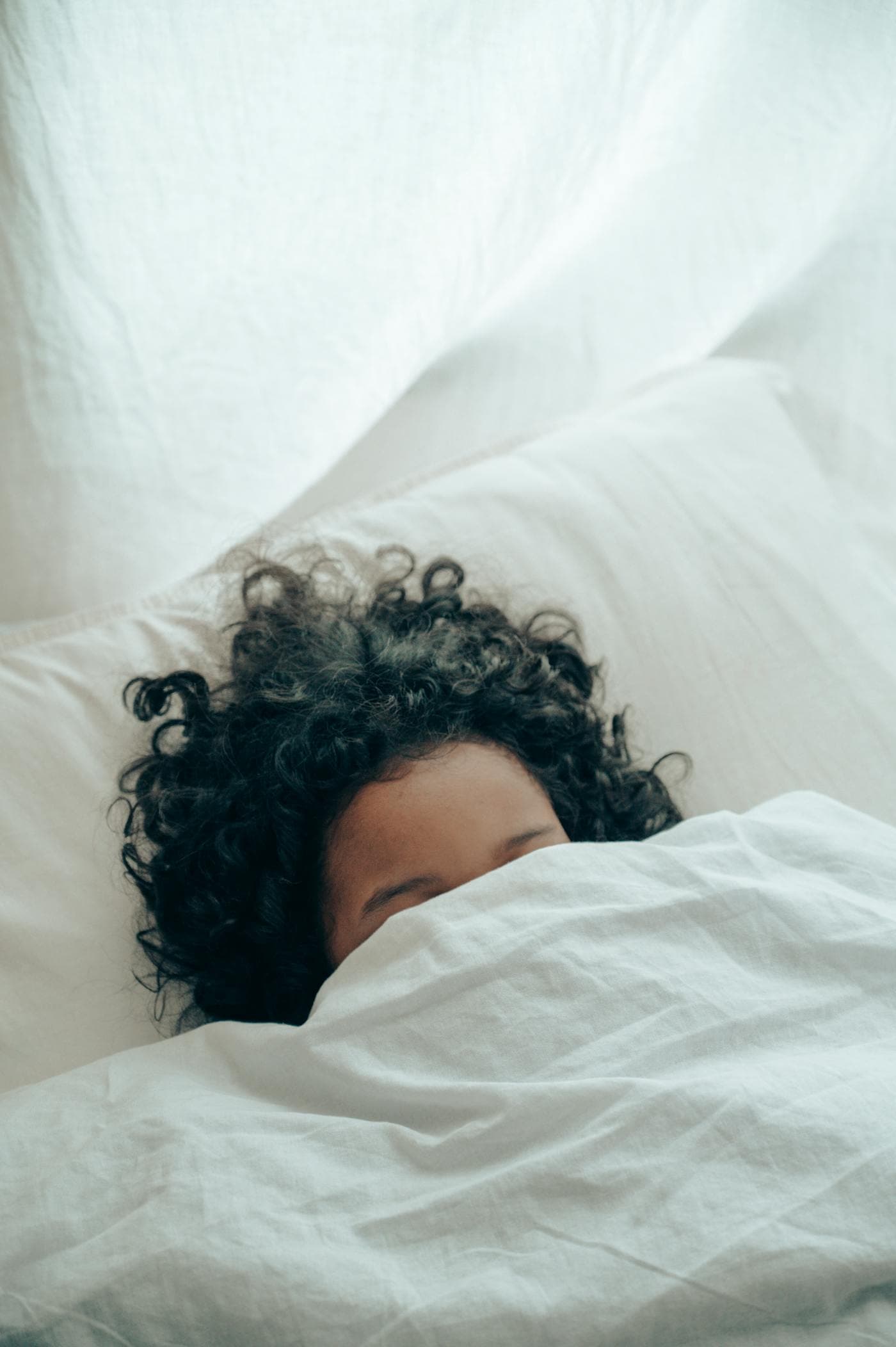 Person sleeping peacefully — grounding during sleep